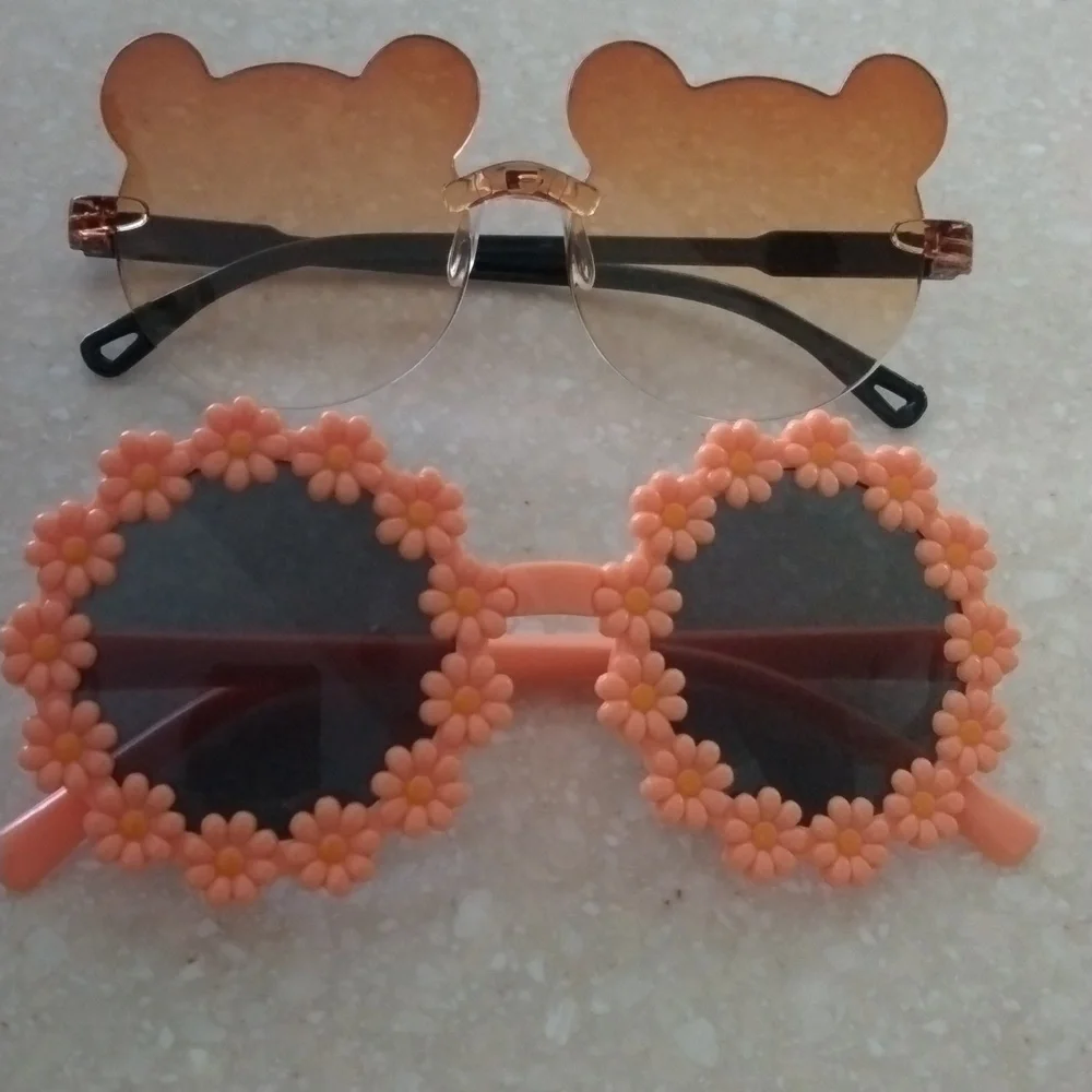 Cool kids sunglasses bundle. Daisies and teddy bears. While they last nw…